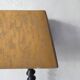 turned wooden lamp with spool base and vintage copper shade