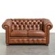 Very spacious 2-seater Chesterfield sofa in cow leather in a English look