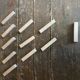 Set of 11 vintage aluminium knife rests from the 1970s