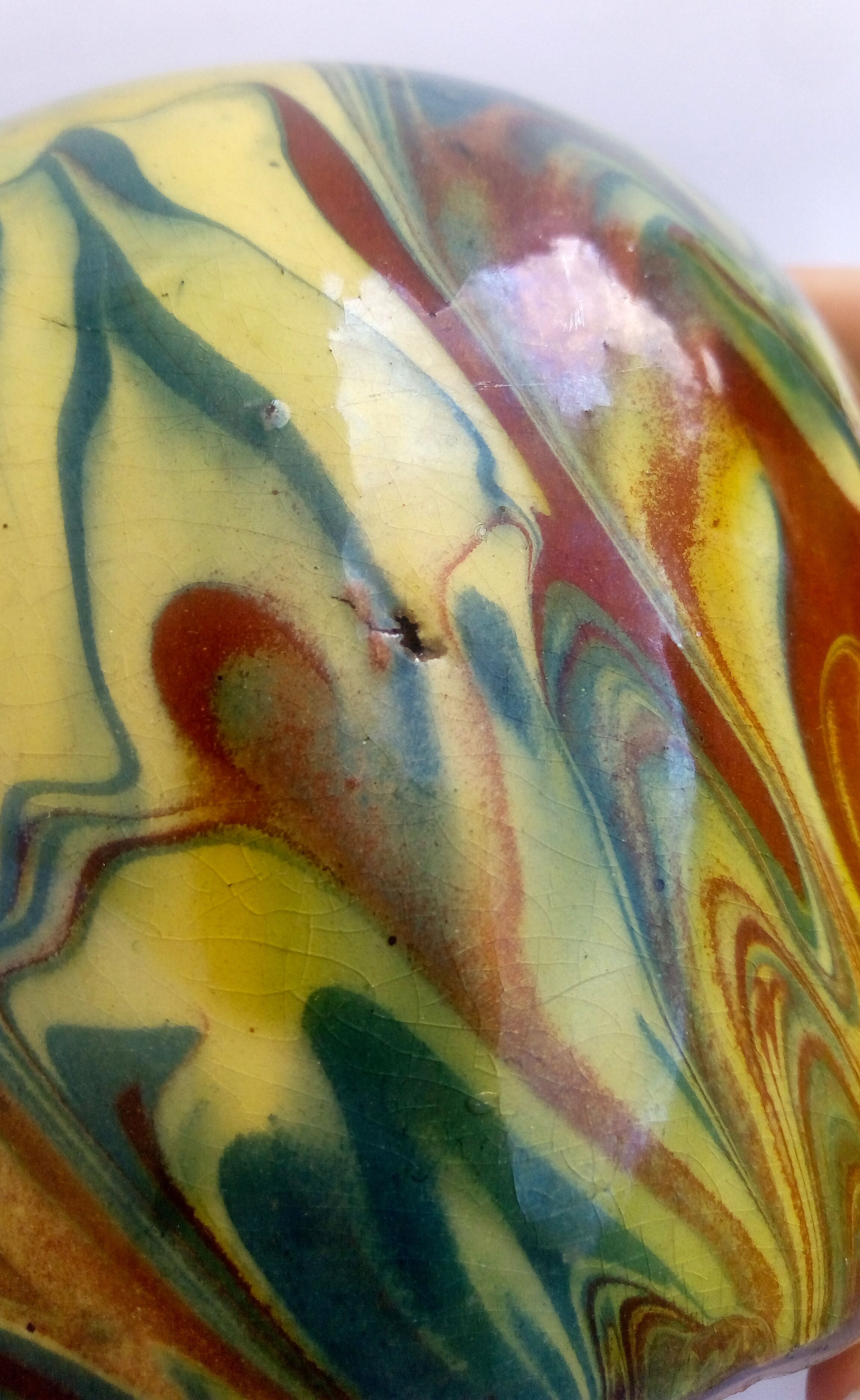 Brown, yellow and green marbled ceramic vase