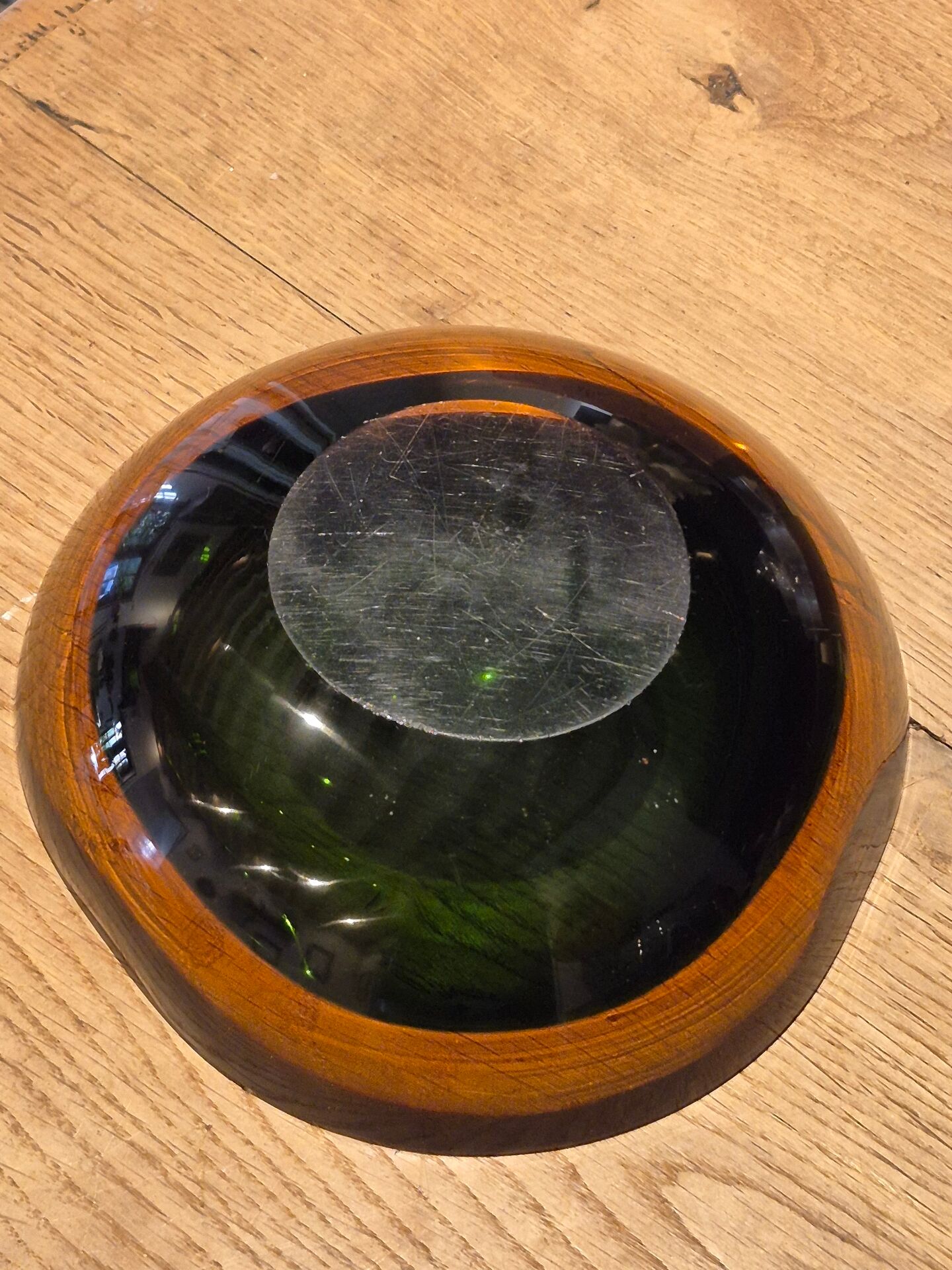 Large vintage Murano glass ashtray in olive green and amber.