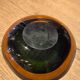 Large vintage Murano glass ashtray in olive green and amber.