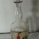 Glass carafe with enamel decoration featuring a rooster, late 19th century.