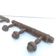 Two wooden coat holders