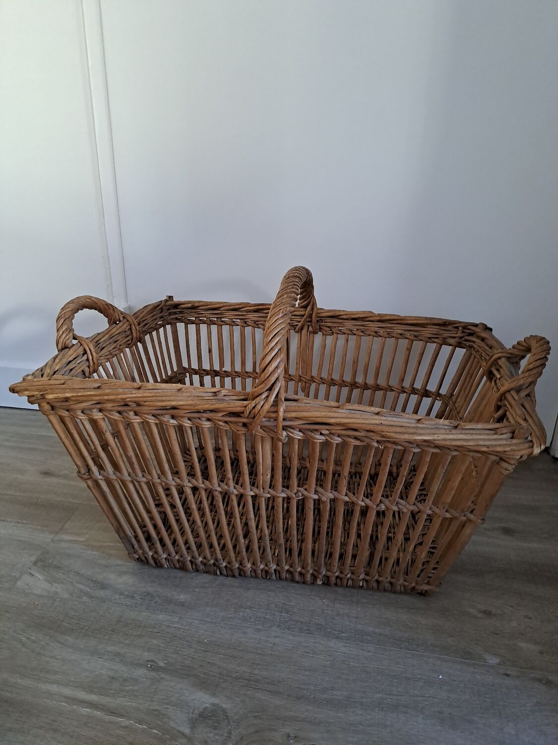 Old rattan laundry basket