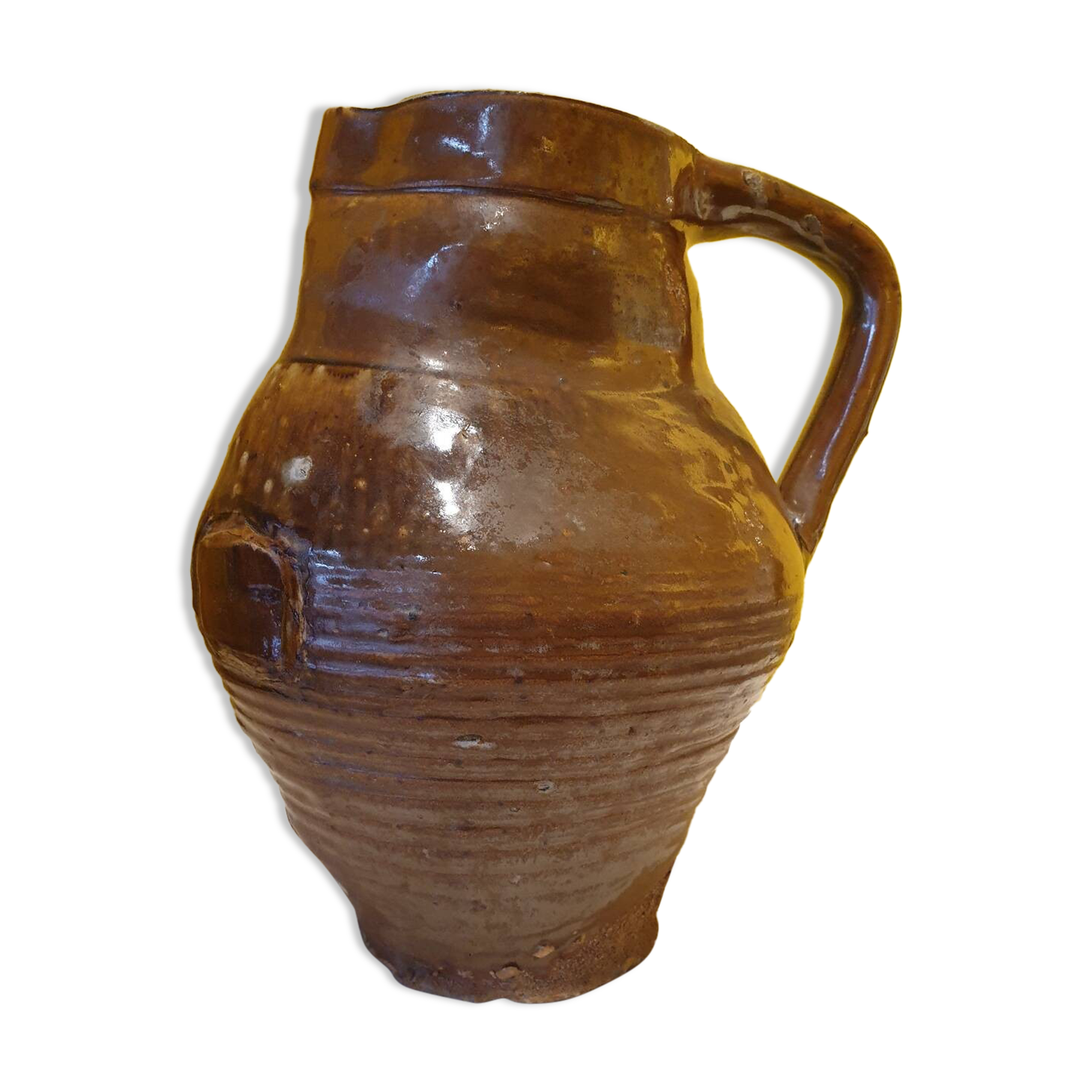 Varnished terracotta pitcher from the 19th century.