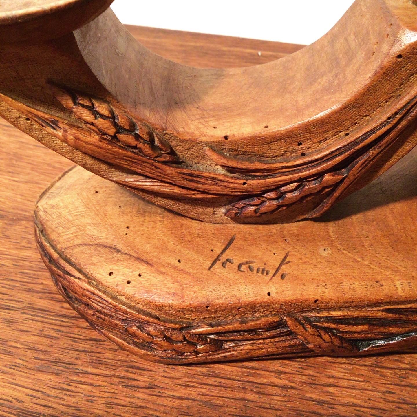 Carved wooden candle holder