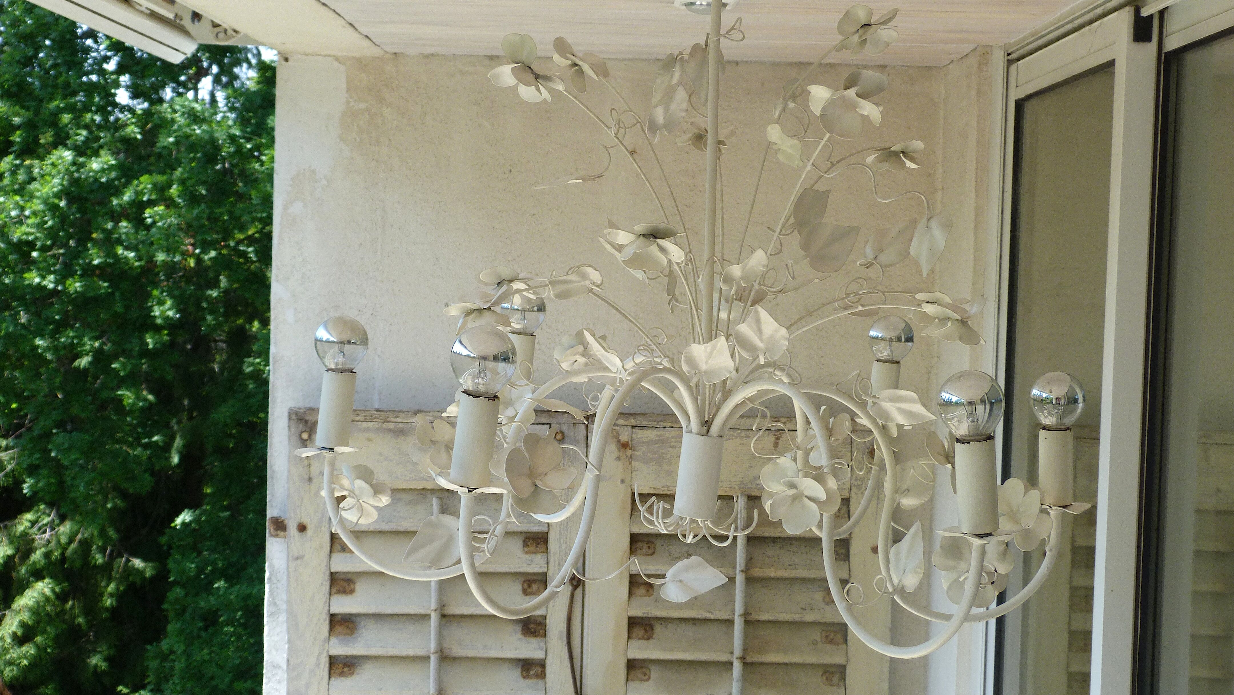 Vintage chandelier in painted metal decoration foliage and flowers