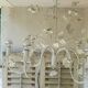 Vintage chandelier in painted metal decoration foliage and flowers