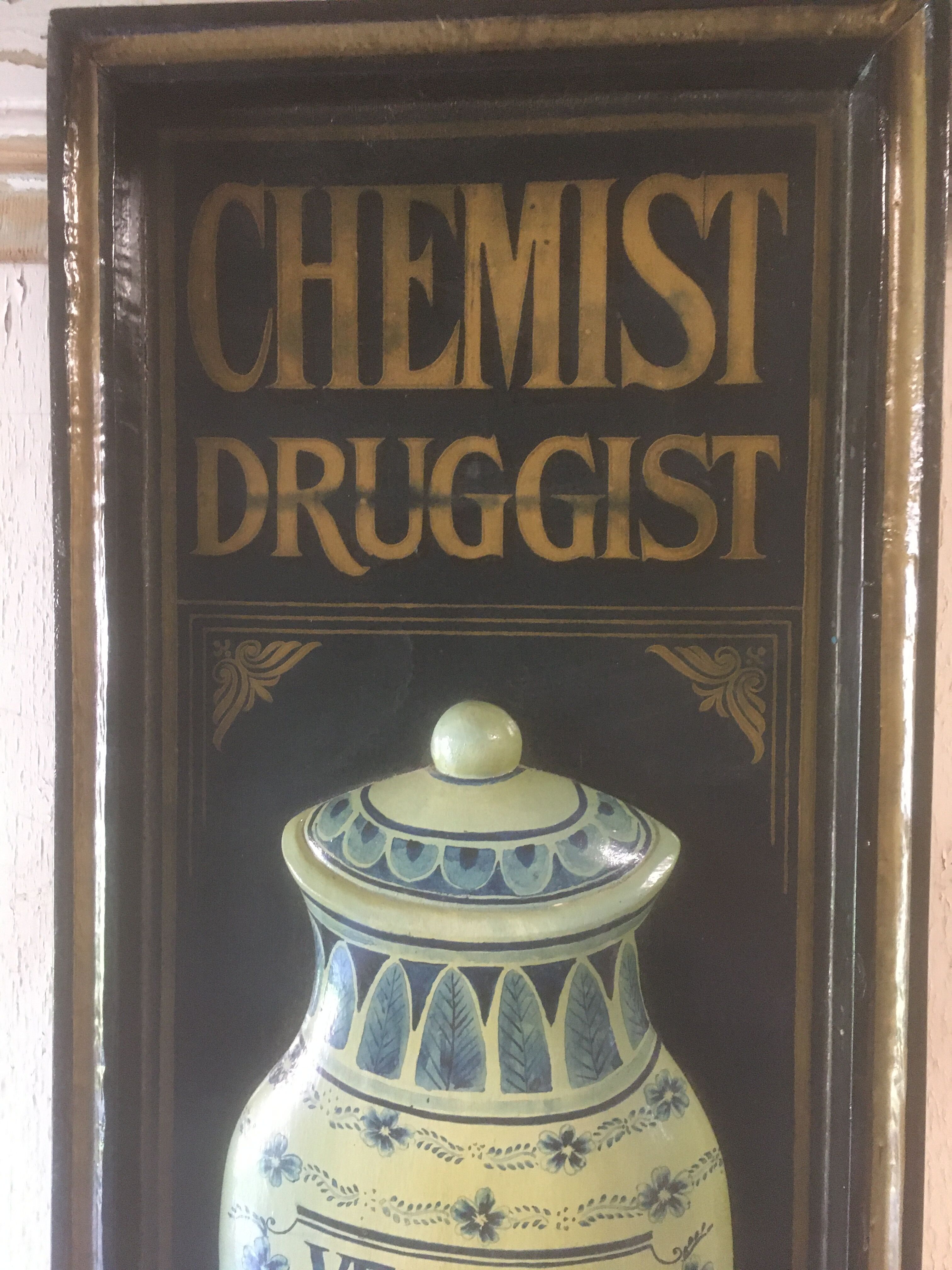 Wooden relief panel "Chemist Druggist" from Country corner