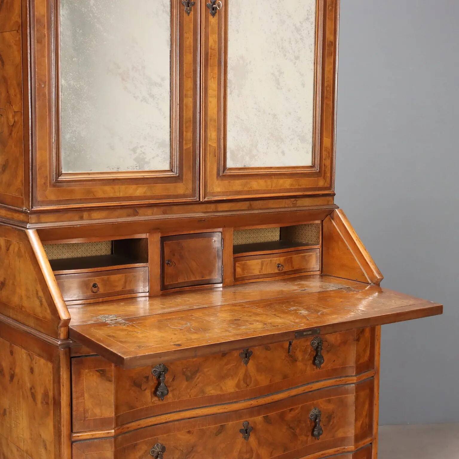 Antique trumeau in walnut, Italy, early 20th century.