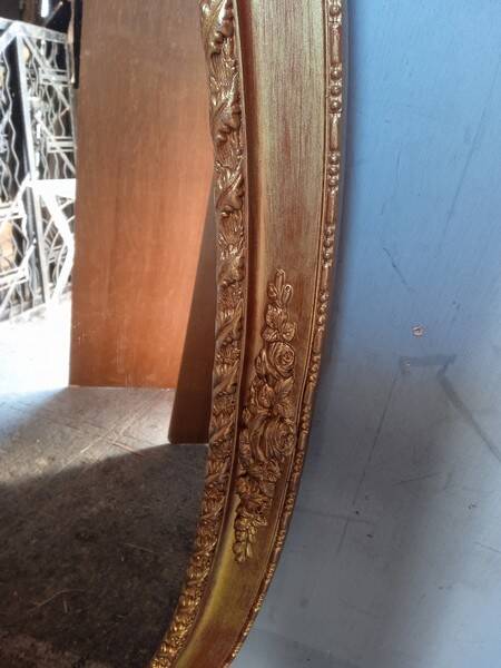 Oval mirror 134cm wood and gilded stucco early 20th century