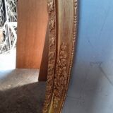 Oval mirror 134cm wood and gilded stucco early 20th century