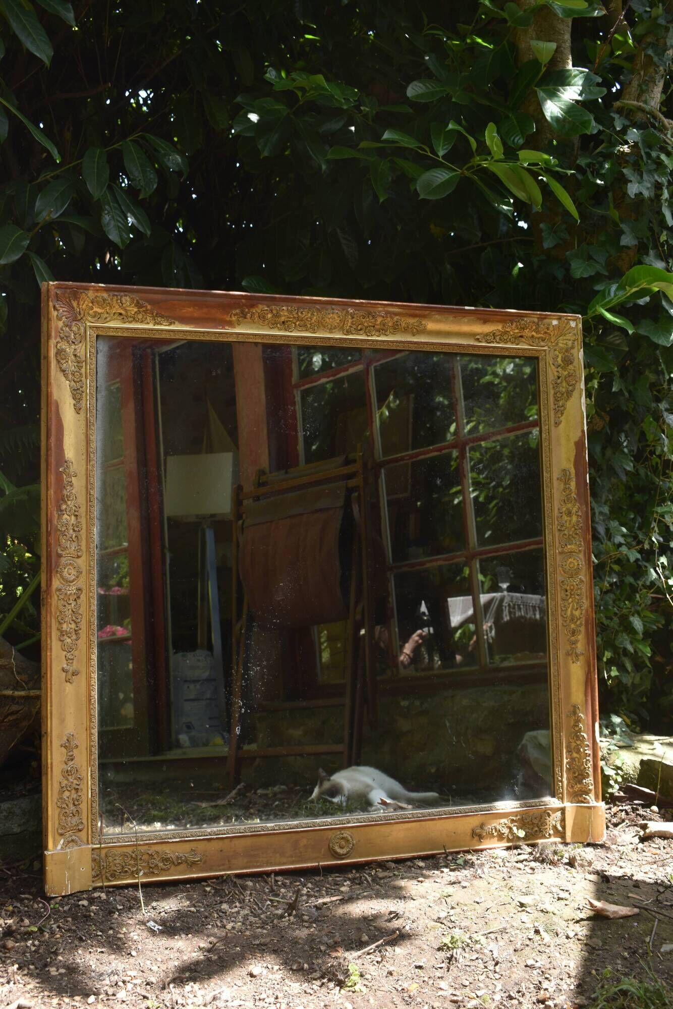 Large gilded Empire mirror from the 19th century.