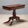 Antique mahogany game table, England, mid-19th century.