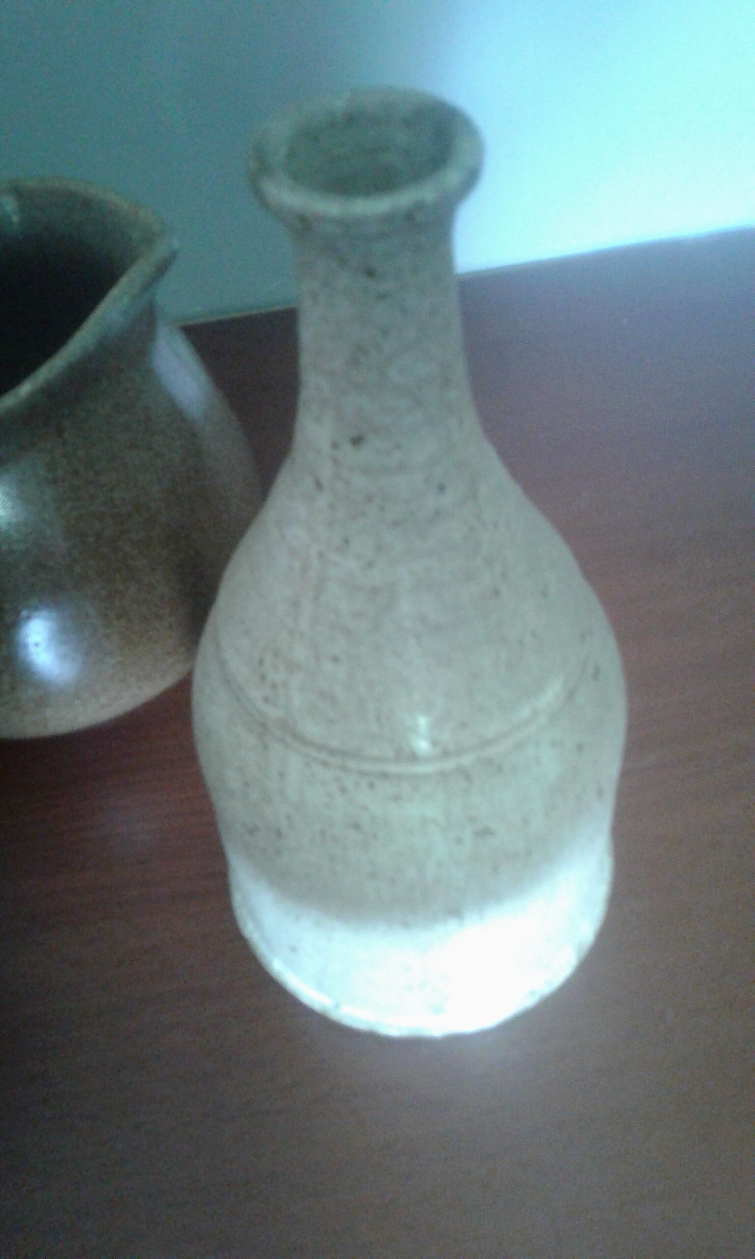 Set of three objects including bottle'milk jar and small stoneware carafon