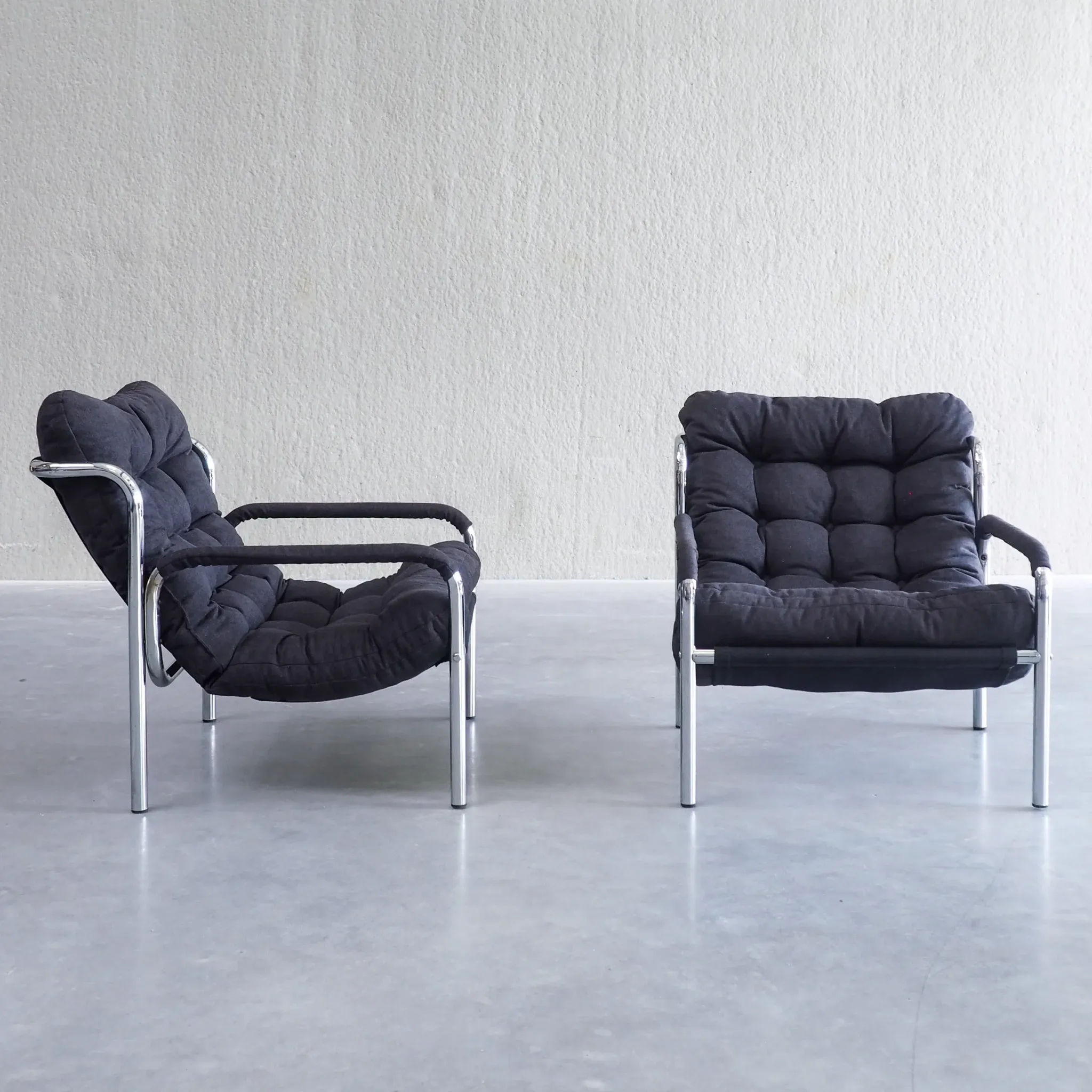 Pair of mid-century modern tubular lounge chairs