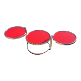 Table basse trois plateaux pivotants en verre rouge et métal chromé