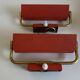 Pair of modernist swivel wall lights in red sheet metal, 1950s