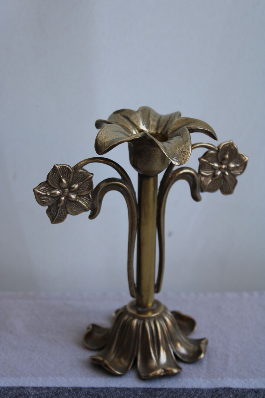 Golden metal stand candle holder