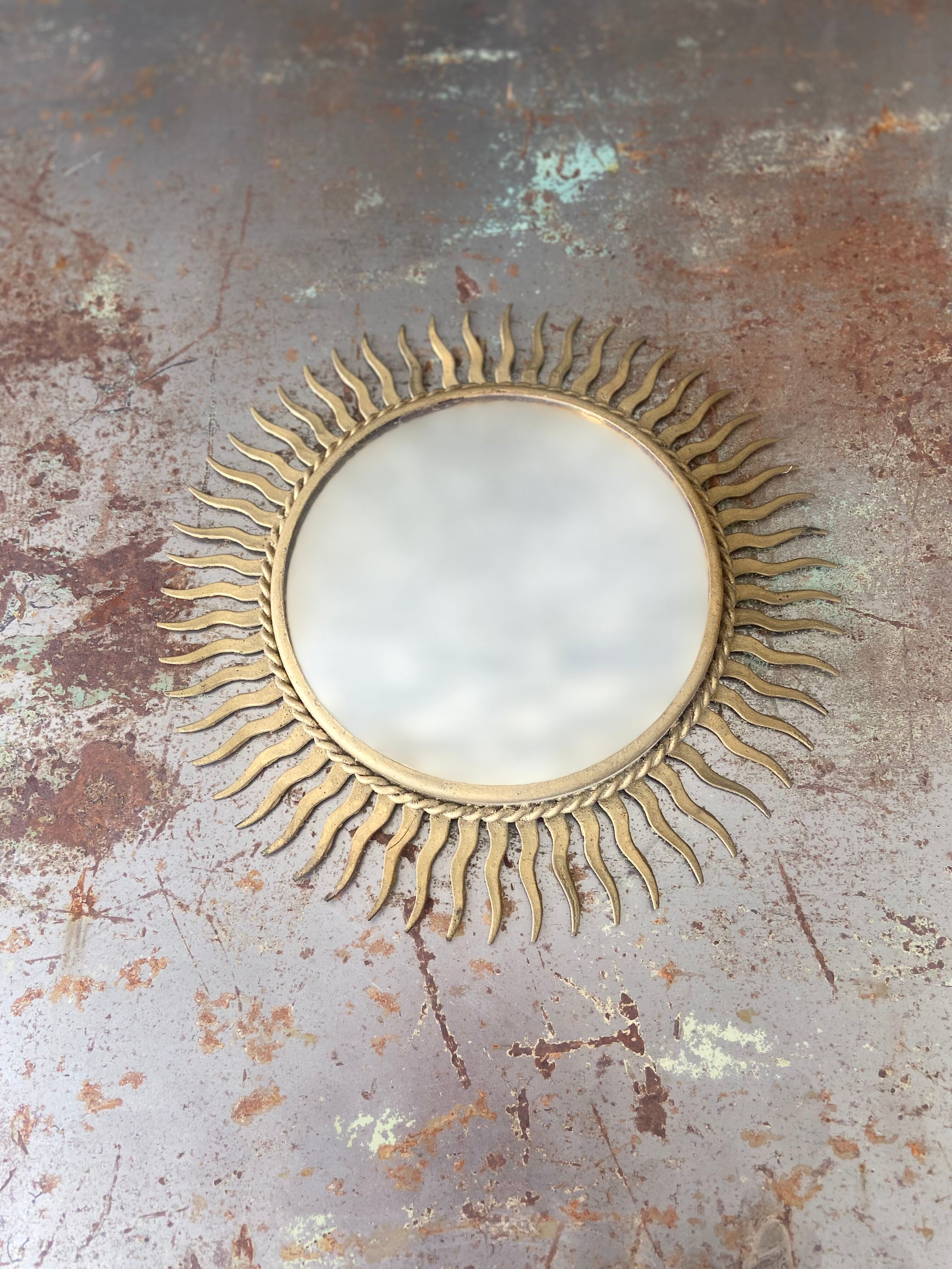 Vintage gold metal sun mirror