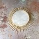 Vintage gold metal sun mirror