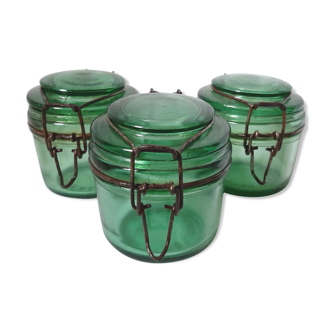 Translucent green glass jars