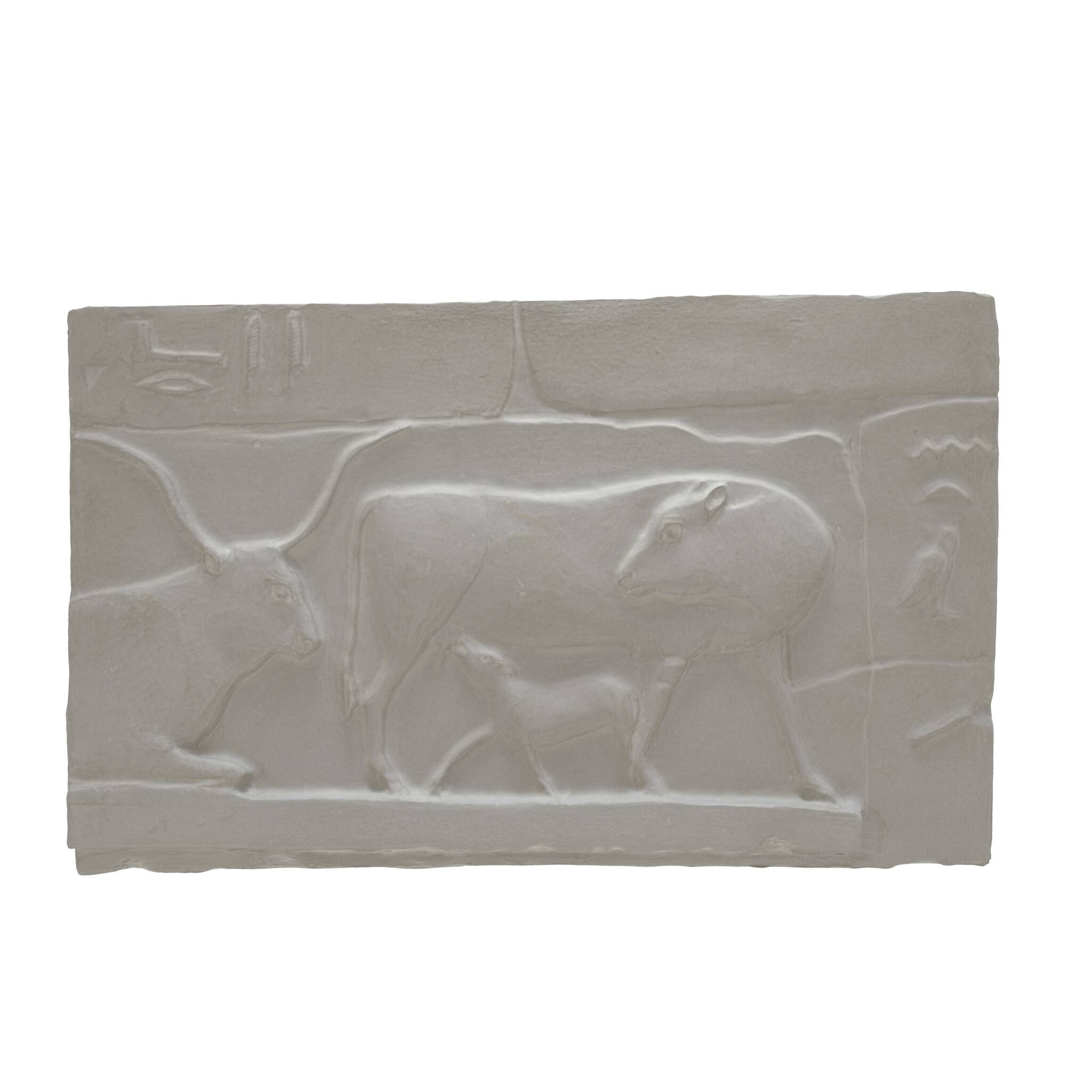 Plaster depicting two cows and a calf, based on an Egyptian fresco.