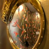 Miroir rond  bombé en laiton doré vintage
