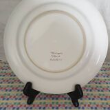 Deep plate with flower decoration