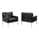 Pair of armchairs in black leather and chrome metal. 1970s.