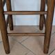 High wooden and straw stools