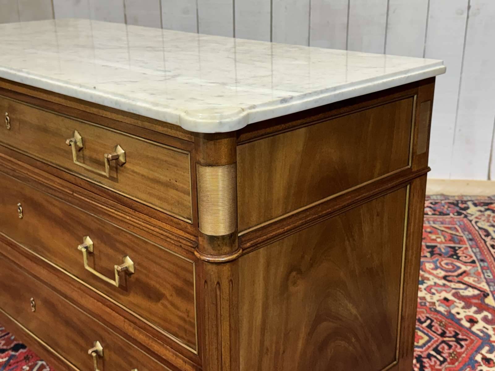Louis XVI commode in mahogany with a marble top from the 1950s.