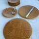 5 Gien plates and 2 caramel 'straw' trays