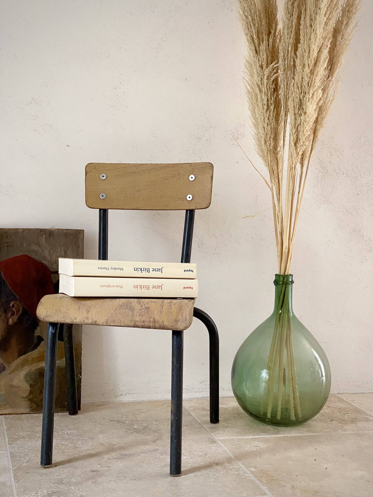 Vintage children's school chair in wood and black metal, industrial style.