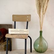 Vintage children's school chair in wood and black metal, industrial style.