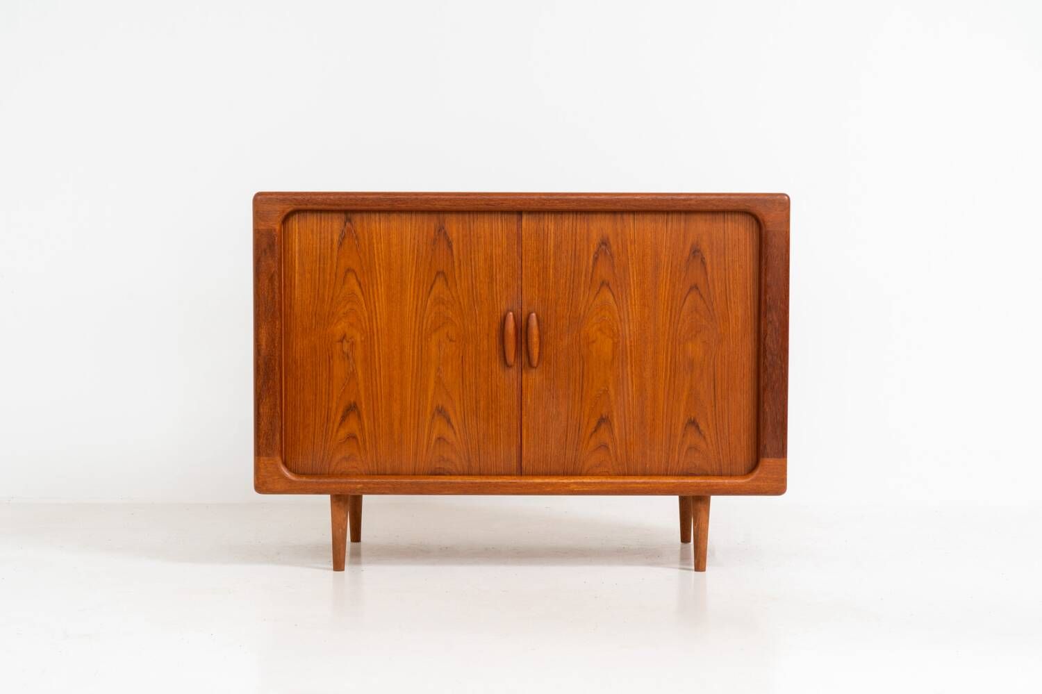 Svend Dyrlund teak sideboard with tambour doors (Denmark, 1960s).