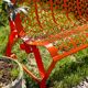 Orange pierced sheet metal bench