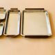 Service of Scandinavian dishes in stainless steel and teak 1970
