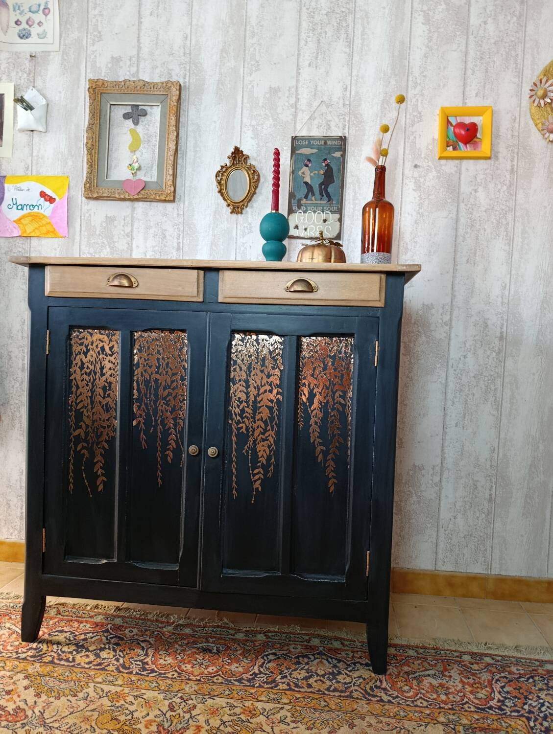 Black Parisian buffet with copper foliage