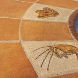 Barrois vintage shell-patterned comma coffee table in wood and ceramic.