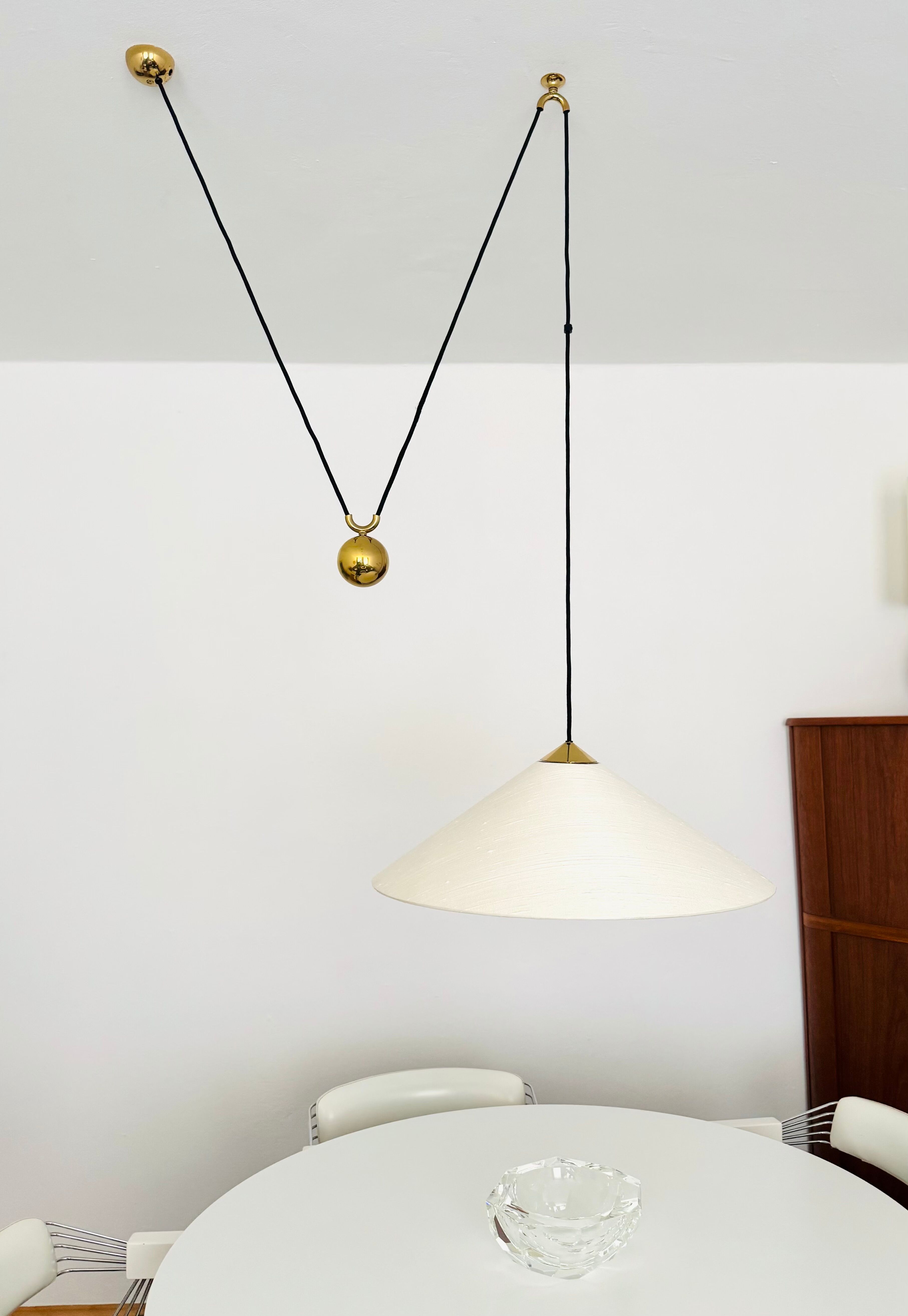 Large Adjustable Brass Pendant Lamp with Counterweight by Florian Schulz