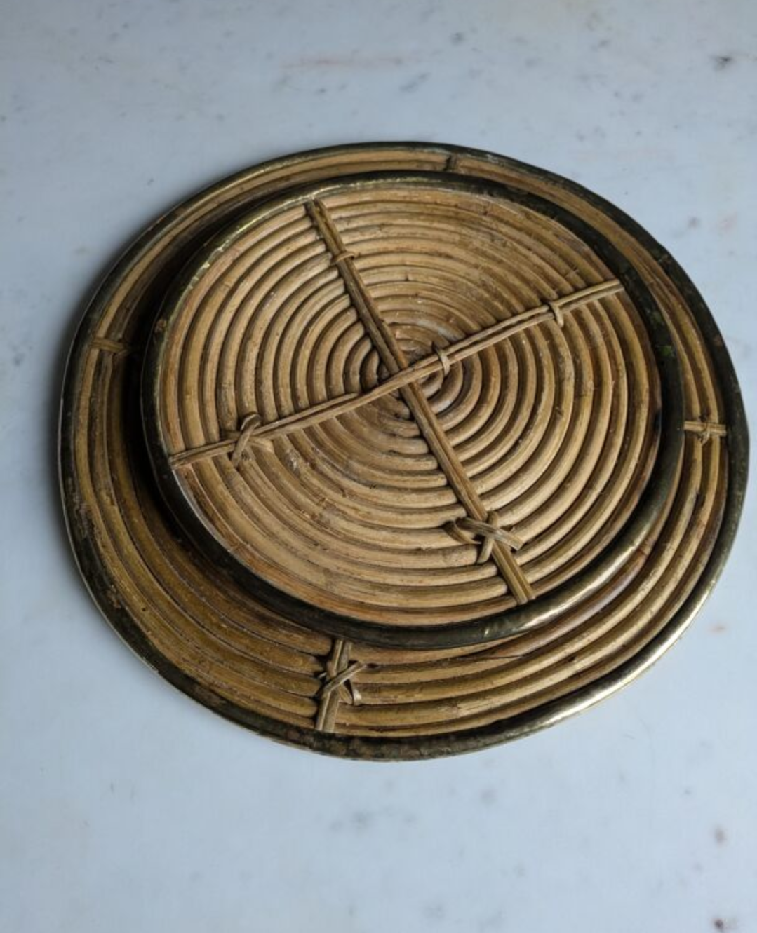 Rattan trivets attributed to Gabriella Crespi.