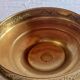 Fruit bowl, basket on foot, compote dish in embossed brass.