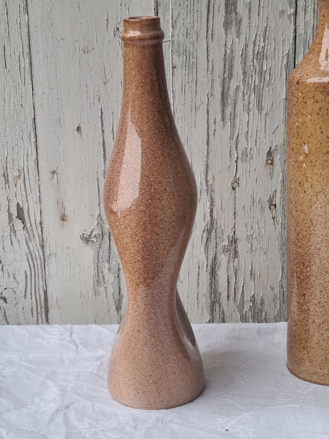 Two bottles glazed terracotta sculpture