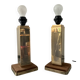 Pair of Hollywood Regency brass table lamps from the 1970s.