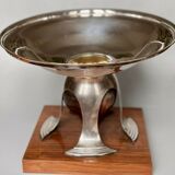 Art deco cut rosewood sphere enclosed in silver metal foot