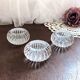Trio of salt shakers, pepper shakers, molded glass salt shakers