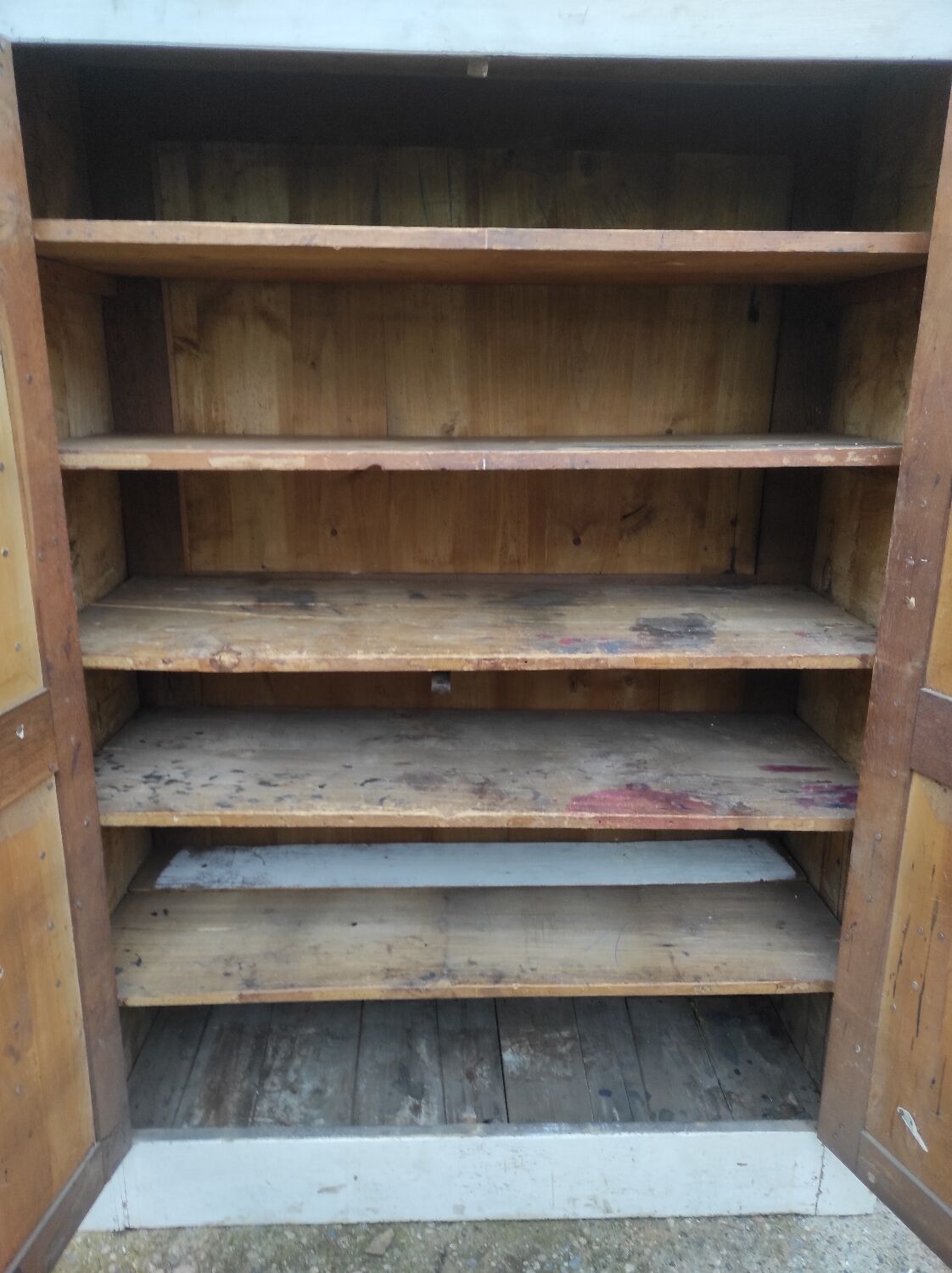 Old rustic Parisian wardrobe patinated white in oak and fir