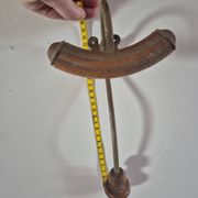 Vintage 1960s wall coat rack in wood and metal.